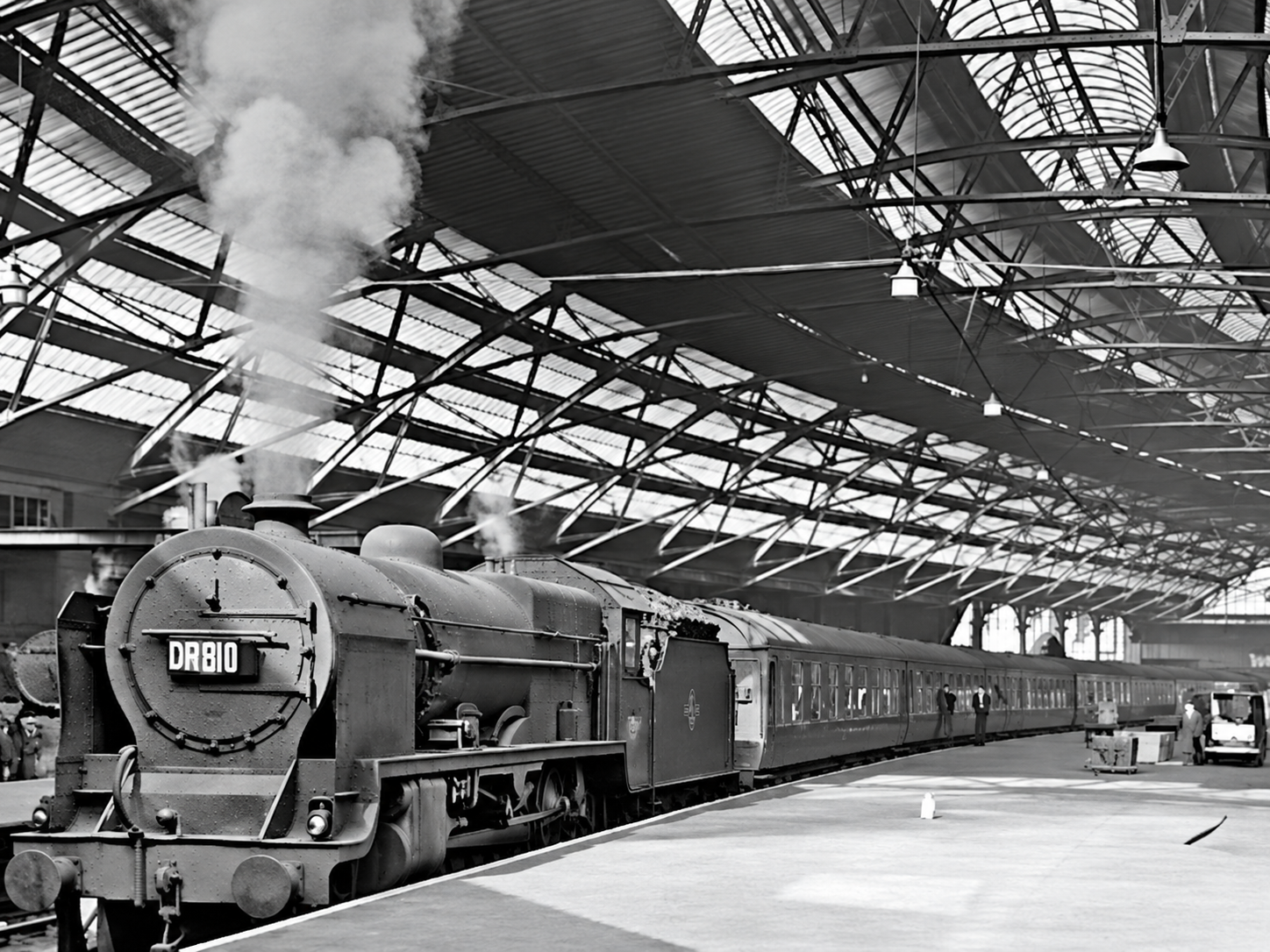 Steam train in an indoor station